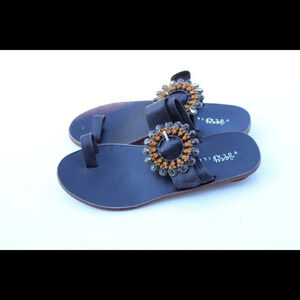 Very volatile jeweled sandals